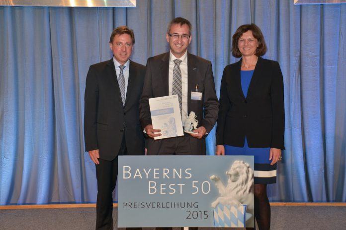 Volker Mitlacher (Mitte) mit Ilse Aigner und Prof. Dr. Thomas Edenhofer